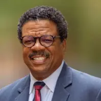 Dr. Milton Perkins